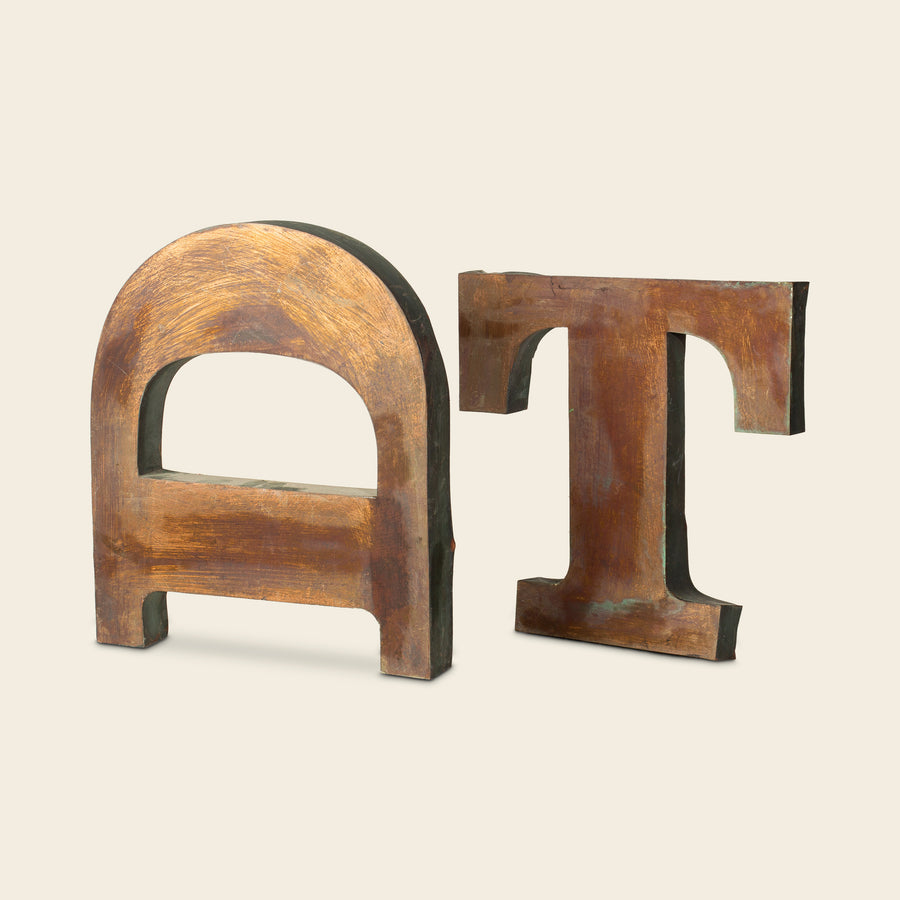 Antique Metal Letters 'A' and 'T'
