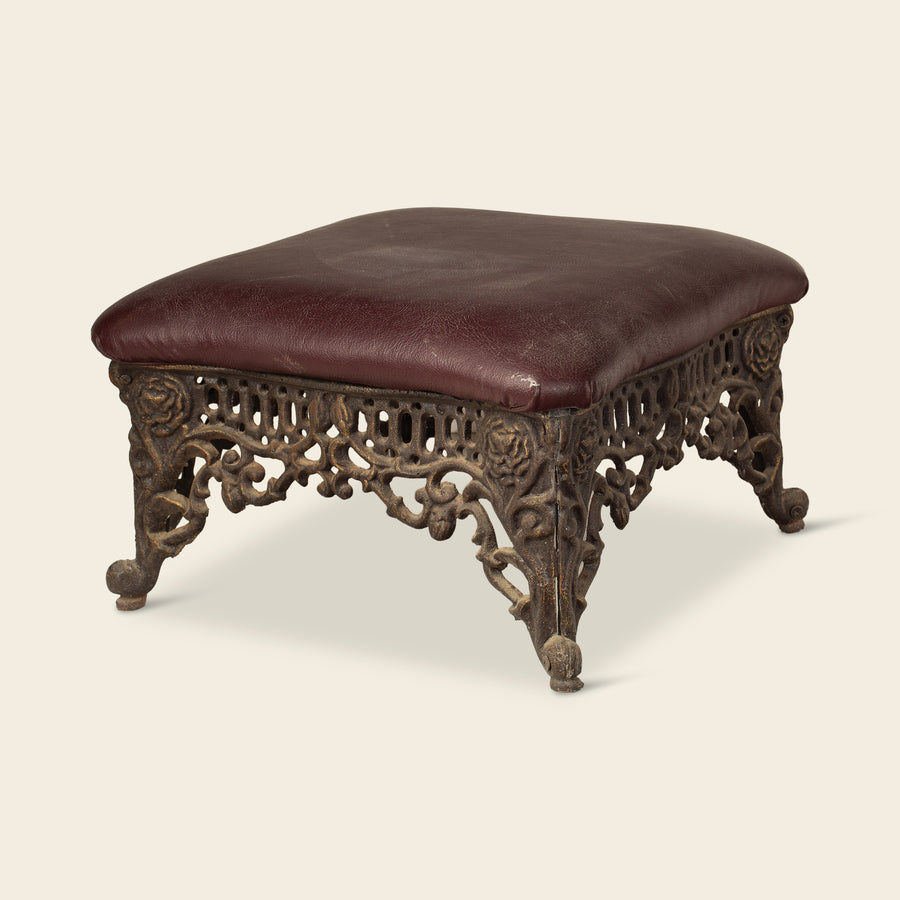Cast Metal Footstool with Leather Cushion